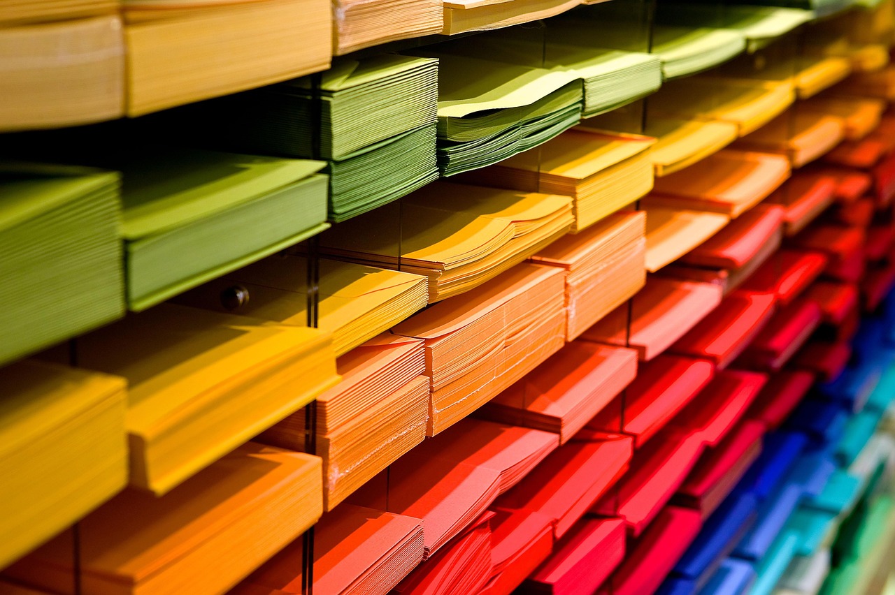 colored paper on shelves